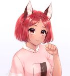  1girl :p animal_ear_fluff animal_ears artist_name closed_mouth collar collared_shirt commentary commission dark-skinned_female dark_skin eloru english_commentary eyelashes fox_ears fox_girl looking_at_viewer original paw_pose pink_shirt pink_sleeves red_eyes red_hair shirt short_hair short_sleeves simple_background smile solo t-shirt tongue tongue_out upper_body white_background white_collar 