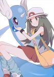  1girl agt_bp bag bare_shoulders blue_shirt blue_socks brown_eyes brown_hair dragonair hat highres leaf_(pokemon) long_hair pleated_skirt pokemon pokemon_(creature) pokemon_frlg red_skirt shirt sitting skirt sleeveless sleeveless_shirt smile socks white_headwear yellow_bag 