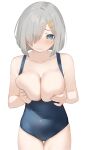  1girl bare_arms bare_legs bare_shoulders black_one-piece_swimsuit blue_eyes blush breasts cleavage closed_mouth collarbone cowboy_shot grey_hair hair_ornament hair_over_one_eye hairclip hamakaze_(kancolle) highres kantai_collection large_breasts one-piece_swimsuit sakieko school_swimsuit short_hair simple_background solo swimsuit white_background 