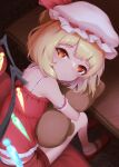  1girl absurdres alternate_costume arm_cuffs blonde_hair camisole closed_mouth commentary flandre_scarlet frilled_camisole frilled_cuffs frilled_socks frilled_straps frills furrowed_brow g2_xpf hat hat_ribbon highres holding holding_stuffed_toy looking_at_viewer mary_janes mob_cap multicolored_wings orange_hair panties panty_peek red_camisole red_footwear ribbon shoes short_shorts shorts sitting socks stuffed_toy symbol-only_commentary table touhou underwear white_socks wings wooden_table 