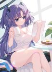  1girl absurdres ajeu914 alternate_costume black_shorts blue_archive breasts camisole cleavage closed_mouth collarbone crossed_legs cup halo highres holding holding_cup holding_tablet_pc large_breasts long_hair mechanical_halo purple_eyes purple_hair shorts solo tablet_pc two_side_up white_camisole yuuka_(blue_archive) 