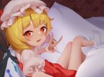  1girl absurdres blonde_hair blush commentary fangs flandre_scarlet frilled_skirt frilled_sleeves frilled_socks frills g2_xpf hat hat_ribbon highres legs_together looking_at_viewer medium_hair mob_cap on_bed one_side_up open_mouth orange_eyes puffy_short_sleeves puffy_sleeves reaching reaching_towards_viewer red_nails ribbon selfie short_sleeves sitting skirt socks solo symbol-only_commentary touhou v white_socks wings 
