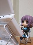  chibi figure handheld_game_console kita_high_school_uniform lowres nagato_yuki nanakusa nendoroid nintendo_ds oversized_object photo school_uniform solo stylus suzumiya_haruhi_no_yuuutsu 