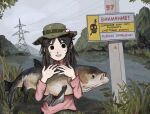 1girl absurdres animal azumanga_daioh black_eyes black_hair breasts brown_hair brown_sweater cloud cloudy_sky commentary_request day fffkorobka fish fish_request grey_hair highres holding holding_animal holding_fish kasuga_ayumu large_breasts medium_hair open_mouth outdoors russian_text sign sky smile solo sweater transmission_tower warning_sign 