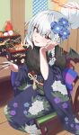  1girl absurdres black_kimono blue_archive blue_flower blush braid chair chopsticks floor flower grey_hair hair_flower hair_ornament halo haruna_(blue_archive) haruna_(new_year)_(blue_archive) highres holding holding_chopsticks japanese_clothes kimono long_hair long_sleeves looking_at_viewer obi official_alternate_costume open_mouth osechi red_eyes red_halo sash side_braid sitting smile solo wide_sleeves wo475712 