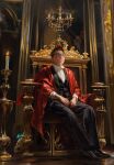  1boy absurdres black_hair black_pants black_shoes black_suit black_vest blue_butterfly bug butterfly candle candlestand chandelier clip_studio_paint_(medium) dress_shoes fire glasses highres indoors jacket laurel_crown male_focus original pants red_robe rick_parsa robe shirt shoes short_hair sitting_on_throne skull solo suit suit_jacket throne very_short_hair vest white_shirt 