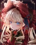  1girl blonde_hair blue_eyes bonnet bow bowtie closed_mouth commentary_request dress drill_hair flower gothic_lolita highres komorihikki lolita_fashion long_hair looking_at_viewer portrait red_dress rose rozen_maiden shinku sidelocks solo 