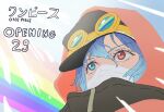  1girl anthony_nguyen bandage_on_face bandages black_hat black_jacket bloom blue_eyes blue_hair blue_sky cloak commentary double-parted_bangs english_commentary from_below goggles goggles_on_headwear gunko hair_between_eyes hat heterochromia highres hood hood_up hooded_cloak jacket light_rays looking_ahead mask mouth_mask one_piece outdoors peaked_cap portrait rainbow red_cloak red_eyes rogatywka short_hair sky solo sunlight 