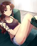  1girl black_lagoon black_shirt blue_shorts breasts brown_eyes brown_hair collarbone couch crossed_arms green_footwear guri1105 highres indoors long_hair looking_at_viewer medium_breasts ponytail revy_(black_lagoon) shirt short_shorts shorts sitting sleeveless sleeveless_shirt solo tattoo torn_clothes torn_shorts 