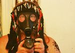  camera feathers gas_mask headdress human lagomorph magic_user rabbit rasta real shaman tattoo tribal_spellcaster 