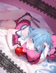  1girl absurdres apple blue_eyes blue_hair blush breasts cleavage food frills fruit hatsune_miku highres hya_ro lace-trimmed_shirt lace_trim light_particles long_hair looking_at_viewer open_mouth pale_skin pillow pink_background polka_dot polka_dot_background red_apple romeo_to_cinderella_(vocaloid) shirt solo thighs vocaloid 