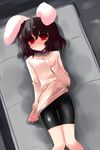  alternate_costume animal_ears bike_shorts black_hair blush bunny_ears contemporary from_above inaba_tewi latex lying on_back red_eyes shin_(new) shirt_tug short_hair solo thigh_gap touhou 