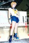  bishoujo_senshi_sailor_moon blonde_hair boots cosplay high_heels lowres pantyhose photo sailor_fuku sailor_uranus school_uniform serafuku shoes short_hair ten'ou_haruka tenou_haruka 