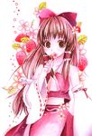  arisie bow brown_hair detached_sleeves flower food fruit hair_bow hakurei_reimu long_hair looking_at_viewer solo strawberry strawberry_blossoms touhou 