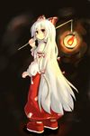  darkness fujiwara_no_mokou hair_ribbon highres juliet_sleeves kibisake lantern long_hair long_sleeves looking_at_viewer looking_back pants paper_lantern puffy_sleeves red_eyes ribbon shirt silver_hair smile solo suspenders touhou tress_ribbon very_long_hair 