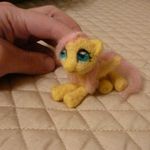  blue_eyes cute disembodied_hand equine eyes female fluttershy_(mlp) friendship_is_magic fur hair hand horse mammal my_little_pony pegasus pink_hair plushie pony real toy unknown_artist wings yellow_fur 