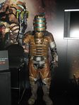  armor cosplay dead_space face gun isaac_clarke lowres male_focus power_suit solo weapon 