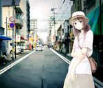  bag between_breasts black_eyes breasts brown_hair eena handbag hat highres long_hair original road skirt smile solo strap_cleavage street vanishing_point 