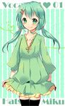  ao_ringo character_name copyright_name green_eyes green_hair hatsune_miku long_hair smile solo thighhighs twintails vocaloid 