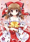  brown_hair detached_sleeves flower frills gohei hair_ribbon hair_tubes hakurei_reimu red_eyes ribbon solo touhou white-brown 