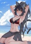  1girl absurdres alternate_hair_color animal_ears armpits arms_up barefoot beach bell bikini bird black_bikini black_hair black_sarong blue_sky bow breasts cat_ears cat_girl cat_tail cleavage closed_mouth cloud collarbone commentary commission dated day english_commentary fourtwelve front-tie_bikini_top front-tie_top hair_bell hair_between_eyes hair_ornament highres looking_at_viewer medium_breasts mismatched_bikini ocean original outdoors ponytail red_bikini red_bow sarong sitting sky smile solo swimsuit tail yellow_eyes yuna_(1230james) 