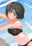  amagami bandeau bikini black_hair blush brown_eyes dutch_angle expressionless halterneck murasaki_iro nanasaki_ai navel ocean one-piece_tan rock short_hair solo swimsuit tan tanline water 