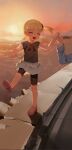  1boy 1girl :d bike_shorts blonde_hair bonnie_(pokemon) brown_shirt clemont_(pokemon) closed_eyes commentary_request hand_up happy highres holding_hands knees korean_commentary open_mouth outdoors pokemon pokemon_x_and_y pokesudal shirt shoes short_hair skirt sky smile standing standing_on_one_leg sun twilight 