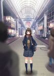  1boy 2girls bag bag_charm blazer blue_bag blue_bow blue_bowtie blue_jacket blue_skirt blue_socks blurry blurry_foreground bow bowtie brown_cardigan brown_hair brown_shoes buttons cardigan charm_(object) commentary_request enpera full_body hands_in_pockets highres ichiha_t iwate_prefecture jacket kneehighs lapels light_particles loafers mall multiple_girls open_clothes open_jacket original photo_background pigeon-toed real_world_location red_scarf sample_watermark scarf school_bag school_uniform shoes skirt socks solo_focus standing twitter_username watermark winter_clothes 