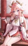  1girl absurdres animal_earrings animal_ears bare_legs bare_shoulders blush breasts cherry_blossoms closed_mouth collarbone commentary_request cup detached_sleeves falling_petals feet_out_of_frame flower fox_ears fox_girl genshin_impact gohei hair_between_eyes hair_ornament highres holding holding_cup japanese_clothes large_breasts long_hair long_sleeves looking_at_viewer looking_up low-tied_long_hair nontraditional_miko petals pink_hair pink_petals purple_eyes sakazuki shirt sitting sleeveless sleeveless_shirt smile solo uting vision_(genshin_impact) wide_sleeves yae_miko 