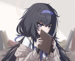  1girl black_hair blue_archive blue_eyes blue_neckerchief blush book brown_cardigan cardigan commentary covering_own_mouth embarrassed hair_between_eyes hair_ribbon hairband halo highres holding holding_book indoors long_hair looking_at_viewer messy_hair neckerchief off_shoulder purple_hairband purple_ribbon raised_eyebrows ribbon sailor_collar shirt solo ui_(blue_archive) upper_body white_sailor_collar white_shirt wrightia 