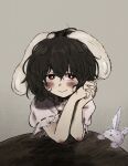  1girl absurdres animal_ears blush brown_hair carrot_necklace closed_mouth commentary_request dress floppy_ears highres igarashi_yuusuke_(wabisabi_buriki) inaba_tewi jewelry looking_at_viewer medium_hair necklace own_hands_clasped own_hands_together pendant pink_dress puffy_short_sleeves puffy_sleeves rabbit rabbit_ears rabbit_girl red_eyes ribbon-trimmed_sleeves ribbon_trim short_sleeves smile solo touhou upper_body 
