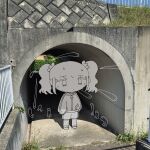  1girl chibi commentary_request creature day echize_n greyscale_with_colored_background highres jacket original outdoors photo_background shorts standing twintails underpass zipper_pull_tab 