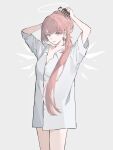  1girl absurdres adjusting_hair arknights arms_behind_head arms_up artemisiaaa chinese_commentary collared_shirt commentary_request cowboy_shot detached_wings earrings grey_background hair_over_shoulder halo hands_in_own_hair highres holding_own_hair jewelry lemuen_(arknights) long_hair looking_at_viewer naked_shirt no_pants pink_eyes pink_hair ponytail shirt short_sleeves simple_background smile solo traditional_halo tying_hair white_shirt wings 
