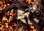  autumn_leaves black_hair black_legwear black_wings blonde_hair cross doll_joints dress gothic_lolita hairband highres kneehighs layered_dress lolita_fashion lolita_hairband long_hair long_sleeves looking_at_viewer lying memai on_back red_eyes rozen_maiden solo suigintou white_background wide_sleeves wings 