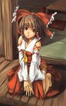  akino_komichi ascot bare_shoulders bow brown_hair detached_sleeves dress feet frilled_bow frills hair_bow hair_tubes hakurei_reimu japanese_clothes kneeling looking_at_viewer miko neck_ribbon no_shoes pleated_skirt red_bow red_dress red_ribbon ribbon ribbon-trimmed_sleeves ribbon_trim short_hair skirt solo tabi thighs touhou white_collar white_sleeves wind wooden_floor wooden_wall yellow_neckwear 