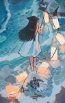  1girl animal_ears barefoot beach black_hair brown_hair commentary_request dress facing_away from_above from_behind highres holding lantern long_hair noco_(pixiv14976070) ocean original outdoors paper_lantern rock shell solo standing sundress turtle wading water white_dress 