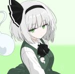  1girl asyu_jp black_bow black_bowtie black_hairband bow bowtie closed_mouth collared_shirt commentary_request green_background green_eyes green_skirt green_vest grey_hair hairband highres hitodama hitodama_print konpaku_youmu konpaku_youmu_(ghost) looking_at_viewer medium_hair shirt skirt skirt_set solo touhou vest white_shirt 
