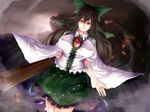  arm_cannon black_hair bow breasts evil_smile green_skirt hair_bow large_breasts long_hair looking_at_viewer minami_koyogi puffy_sleeves red_eyes reiuji_utsuho skirt smile solo touhou weapon wings 