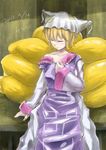  bad_id bad_pixiv_id blonde_hair closed_eyes dated dress fox_tail hat highres long_sleeves multiple_tails off_shoulder pillow_hat queruru short_hair sitting solo tabard tail touhou undressing wide_sleeves yakumo_ran 
