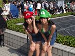  2girls absurdres comiket comiket82 cosplay highres luigi luigi_(cosplay) mario mario_(cosplay) mario_(series) multiple_girls nintendo photo real_life super_mario_bros. 