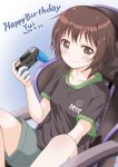  1girl between_legs black_shirt blue_background blush brown_eyes brown_hair chair commentary_request controller copyright_name dated dot_nose funami_yui game_controller gaming_chair gradient_background hand_between_own_legs happy_birthday holding holding_controller holding_game_controller legs_up machiyama_akane on_chair shirt sitting smile solo swivel_chair white_background yuruyuri 