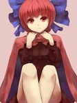  bare_legs blouse bow cape hair_bow head_tilt highres knees_up light_smile long_sleeves looking_at_viewer purple_background red_eyes red_hair sekibanki shone short_hair simple_background skirt solo touhou 