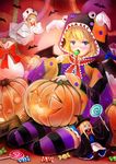  alice_margatroid blonde_hair candy food halloween highres jack-o'-lantern pumpkin sai-go shanghai_doll short_hair solo striped striped_legwear thighhighs touhou 