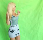  animated animated_gif blonde_hair bouncing_breasts cleavage huge_breasts jessica_nigri photo shaking skirt smile 