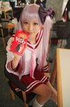  cosplay highres hiiragi_kagami hiiragi_kagami_(cosplay) lucky_star photo pocky saya saya_(cosplayer) school_uniform serafuku skirt twintails 