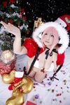  1girl asian box breasts cage candy chouzuki_maryou christmas christmas_tree cosplay gift gift_box headphones large_breasts nitroplus photo pink_hair plump present solo stocking super_sonico super_sonico_(cosplay) thighhighs 