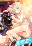  bare_legs blonde_hair book camera dress green_eyes lens long_hair lying on_side original pillow solo strap_slip tokiame white_hair 