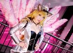  1girl ahri animal_ears blonde_hair cosplay ekiholic facial_mark fang fox_ears fox_tail hat highres league_of_legends long_hair photo popstar_ahri tail yellow_eyes 