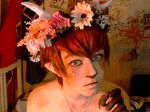  animated bedroom cervine circlet cosplay doe-eyes faun flower freckles hair makeup male mammal necklace pointed_ear prosthetic real red_hair 