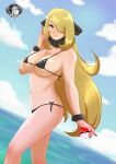  1girl absurdres artist_logo bikini black_bikini blonde_hair blue_sky blurry blurry_background breasts closed_mouth cloud cynthia_(pokemon) day from_side fur_collar fur_cuffs hair_ornament hair_over_one_eye highres holding holding_poke_ball index_finger_raised large_breasts long_hair looking_at_viewer navel ocean outdoors poke_ball poke_ball_(basic) pokemon pokemon_dppt purple_nails sky smile solo stomach strap_gap string_bikini swimsuit theshini thighs very_long_hair 